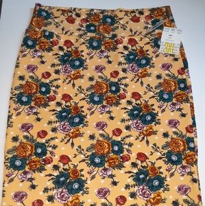 Cassie Lularoe Pencil 3xl Skirt Orange background with multi floral design.
